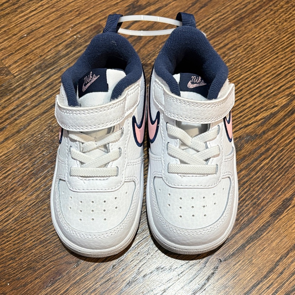 Nike Kids White Sneakers with Pink Accents